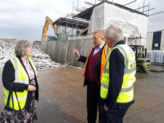 Peter Bone and Cllr Gill Mercer with Simon Scholes at the recycling plant.