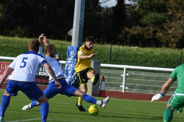 Sam Johnson fires the ball towards goal for Diamonds