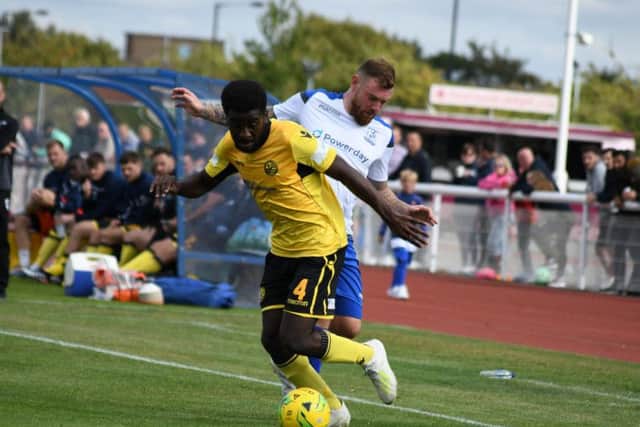 Ben Acquaye gets away from an opponent