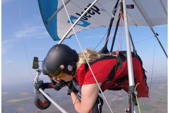 Stephanie went hang-gliding to raise money for charity as part of her pageant entry