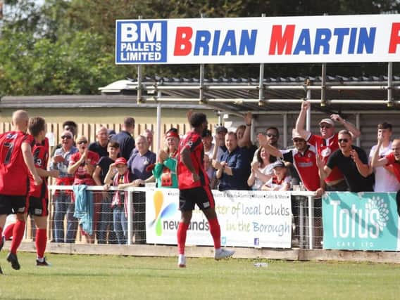 Dan Nti celebrates after he gave Kettering Town an early lead from the penalty spot in the 2-1 win over Alfreton Town. Pictures by Peter Short