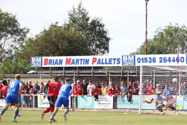 Dan Nti picked himself up to score from the penalty spot and give Kettering the lead