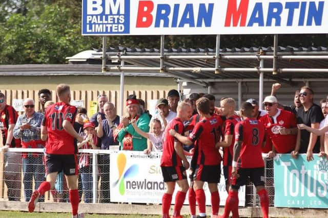 Dan Nti takes the congratulations after he gave his team an early advantage