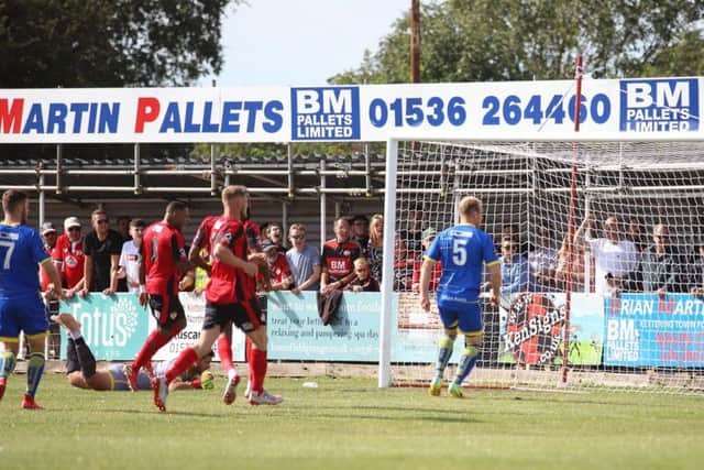 Marcus Kelly's shot finds the net to make it 2-0 to the Poppies