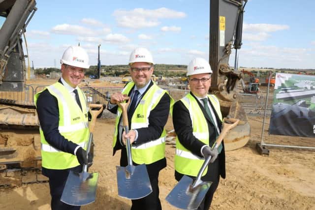 Kier MD James Hinde, Northamptonshire County councillor Jason Smithers and Justice secretary Robert Buckland QC on site at Wellingborough prison today.