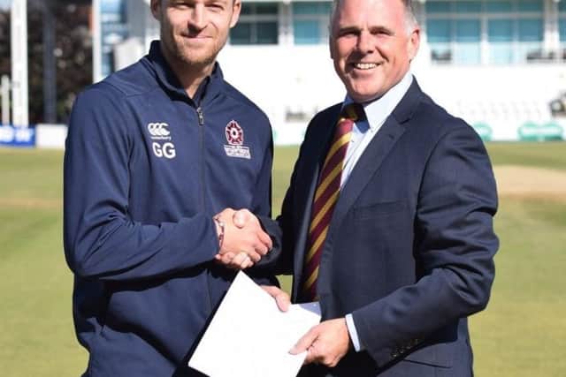 Graeme White is staying with Northants
