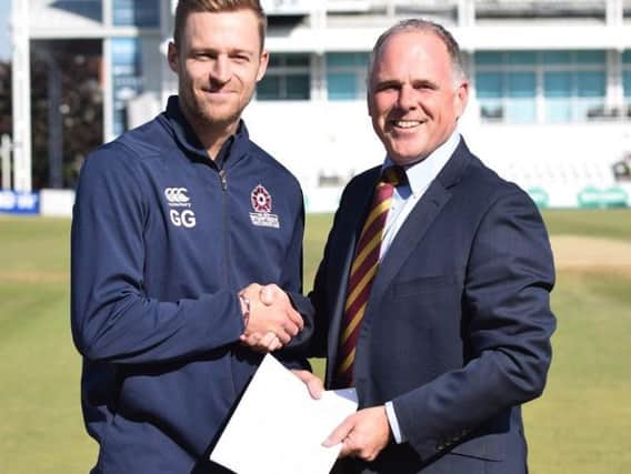 Graeme White is staying with Northants