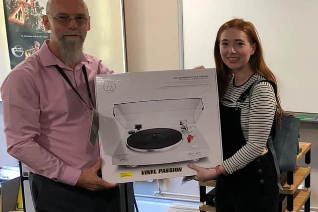 Michaela O'Sullivan receives her prize from Mark Sears