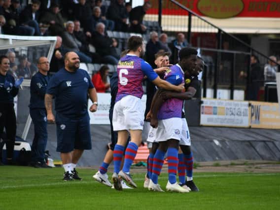 Ben Acquaye celebrates after his fine free-kick gave AFC Rushden & Diamonds the lead in their 1-1 draw at Hednesford Town at the weekend. Picture courtesy of HawkinsImages