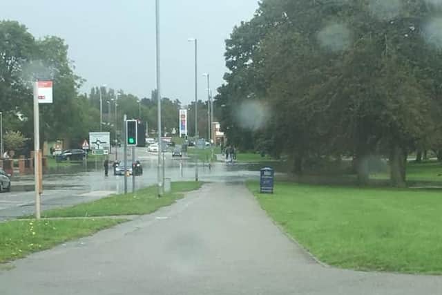 The road is well known for frequently flooding. It looks as if a different car was stuck in the water earlier today