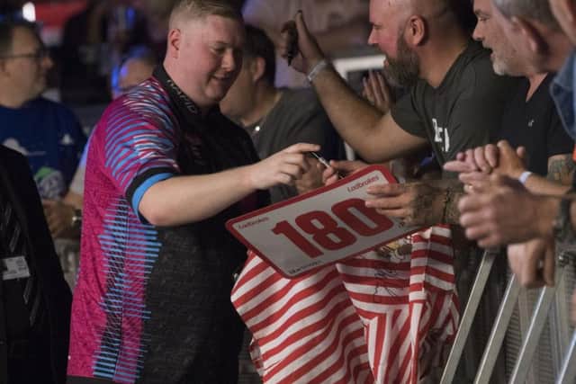 Ever the showman, Kettering's Ricky Evans will play in the opening match of the World Grand Prix in Dublin on Sunday night
