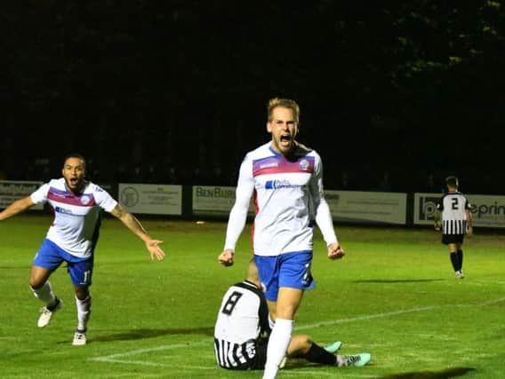 Jack Bowen shows his delight after he scored AFC Rushden & Diamonds' opening goal in the 3-2 win over Corby Town in the Southern League Challenge Cup on Tuesday night. Pictures courtesy of HawkinsImages