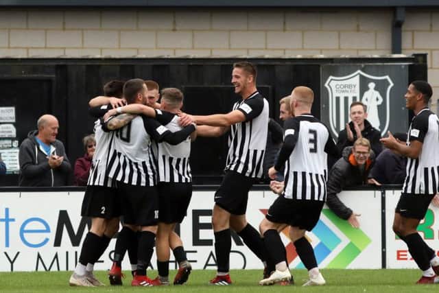 Steve Diggin takes the congratulations after he scored the Steelmen's second goal