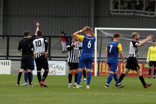 Joint-manager Gary Mulligan was sent-off late on in Corby's wins