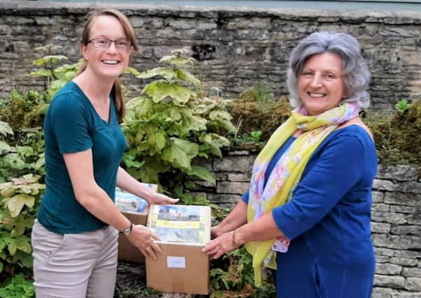 Ali Brand-Barker from Nenescape  hands over new trails to Elaine Wakerley
