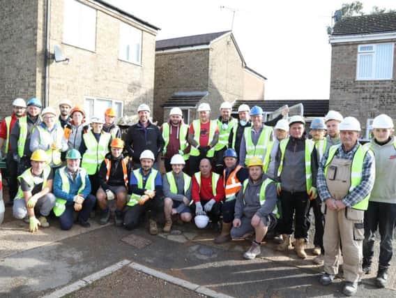 DIY SOS presenter Nick Knowles and some of the volunteers