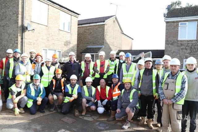 DIY SOS presenter Nick Knowles and some of the volunteers