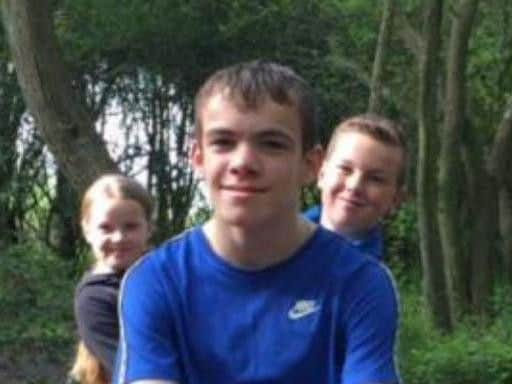 Jordan Hutchison with is brother and sister