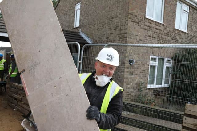 Corby Town fan Mark Kilgallon who has used his holiday to help