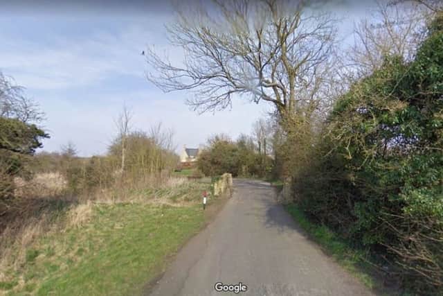 The stretch of road going towards Thorpe Waterville