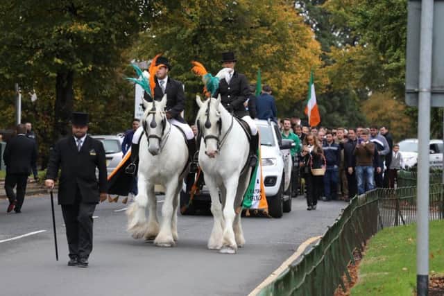 A large funeral procession walked through Kettering today from St Edward's church to Warren Hill crematorium