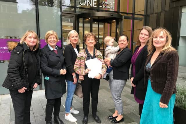 Candidate for Northampton North MP Sally Keeble, parents of the children at Northgate and Beehive and councilor for Delapre and Briar Hill Julie Davenport pictured handing over the petition today to cabinet member for children's services Fiona Baker.
