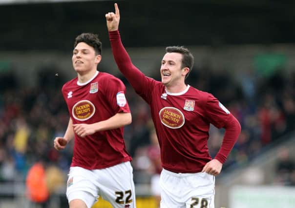 ROY'S THE BOY - Roy O'Donovan celebrates after scoring the Cobblers' second against Accrington (pictures: Kelly Cooper)