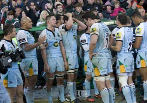 DERBY PAIN - Saints players look despondent at the end of the defeat to Leicester Tigers at Welford Road in November (Picture: Linda Dawson)