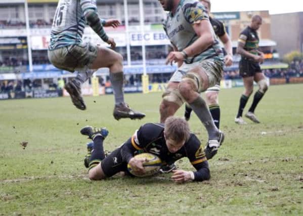 TRY GUY - Stephen Myler dives over for his try against Leicester Tigers (picture by Linda Dawson)