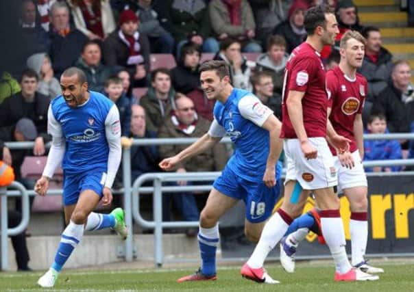 GOAL - Ashley Chambers celebrates after giving York the lead at Sixfields (pictures: Sharon Lucey)
