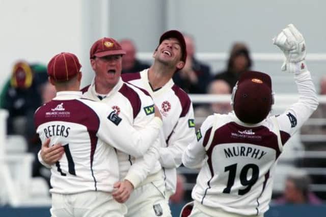 David Sales is congratulated after taking a magnificent catch to dismiss Mark Pettini