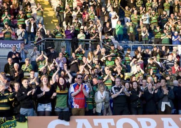 ALL SMILES - the Saints fans enjoyed Saturday's demolition of Sale at Franklin's Gardens (Picture: Linda Dawson)