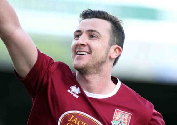 HAPPY MAN - Roy O'Donovan is all smiles after putting the Cobblers ahead against Barnet (pictures: Kirsty Edmonds)