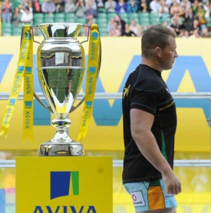 Northampton's Dylan Hartley walks past the Premiership trophy after the Aviva Premiership Final at Twickenham, London. PRESS ASSOCIATION Photo. Picture date: Saturday May 25, 2013. Photo credit should read: Clive Gee/PA Wire. RESTRICTIONS: Use subject to restrictions. Editorial use only. No commercial use. Call +44 (0)1158 447447 for further information.