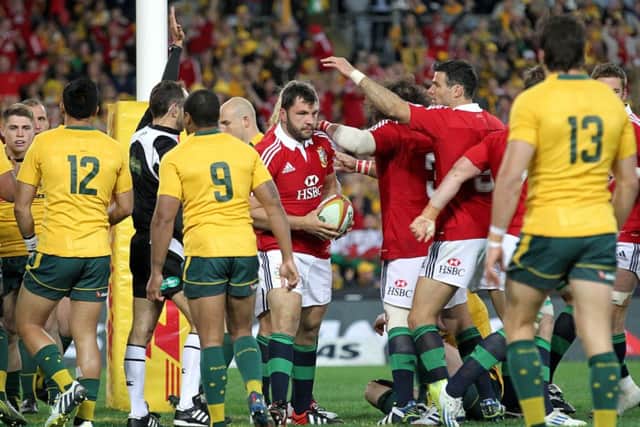 British and Irish Lions' Alex Corbisiero (centre) is congratulated on scoring their first try of the game during the Third Test match at the ANZ Stadium, Sydney, Australia. PRESS ASSOCIATION Photo. Picture date: Saturday July 6, 2013. See PA story RUGBYU Lions. Photo credit should read: David Davies/PA Wire. RESTRICTIONS: Editorial use only, Non-commercial use, Photographs cannot be altered or adjusted other than in the course of normal journalistic or editorial practice. Call 44 (0)1158 447447 for further information.