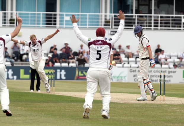 David Willey, who took 5-108, bowls Kyle Hogg for a duck