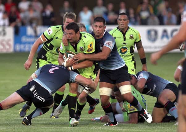 Phil Dowson is tackled during Saints' pre-season friendly at Bedford (pictures: Tony Waugh)