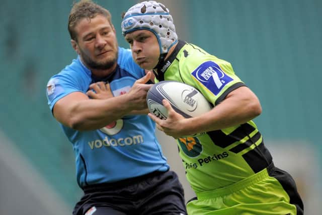 Northampton's Ollie Lyons is tackled against DHL Western Province during the World Club Sevens at Twickenham Stadium, London. PRESS ASSOCIATION Photo. Picture date: Saturday August 17, 2013. See PA story RUGBYU World Club. Photo credit should read: Tim Ireland/PA Wire