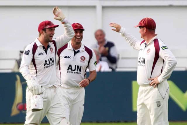 LVCC. 
Worcs V Northants at New Road. 
Northamptonshire players celebrating during their match against Worcestershire after hearing the Essex score which means they are promoted.