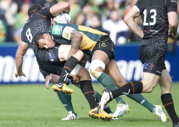 FAMILIAR SIGHT - Courtney Lawes gets his man in Saints' win against Ospreys last Saturday (Pictures: Linda Dawson)