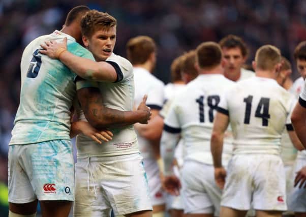 England's Owen Farrell celebrates at the final whistle with Courtney Lawes after the QBE International at Twickenham