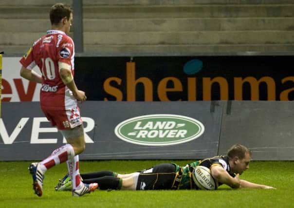 TRY GUY - Paul Diggin goes over for the Wanderers' first score against Gloucester on Monday night (Picture: Linda Dawson)