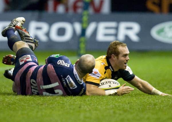 MAKING HIS MARK - Alex Day slides in for one of his two tries against Gloucester (Picture: Linda Dawson)