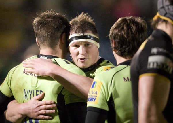 HUGGING IT OUT - Dylan Hartley congratulates Stephen Myler after Saints' last-gasp win at Wasps (Picture: Linda Dawson)