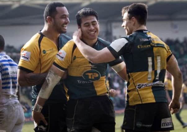 HAT-TRICK HERO - George Pisi is congratulated after starring in Saints' win against Saracens (Picture: James Phillips)