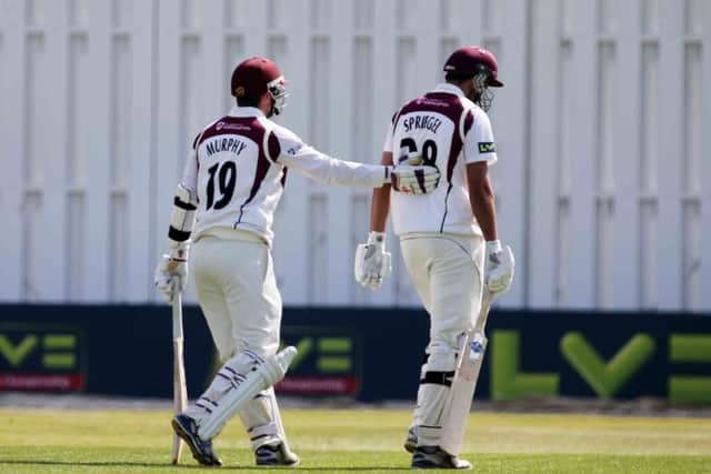 A dejected Matthew Spriegel departs after making 97 against Durham