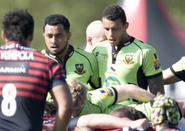 BRUISE BROTHERS - Samu Manoa and Courtney Lawes put in some big hits for Saints against Saracens (Pictures: Linda Dawson)