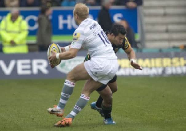 BIG HIT - George Pisi put in a huge tackle on Shane Geraghty during Saints' win over London Irish (Picture: Linda Dawson)