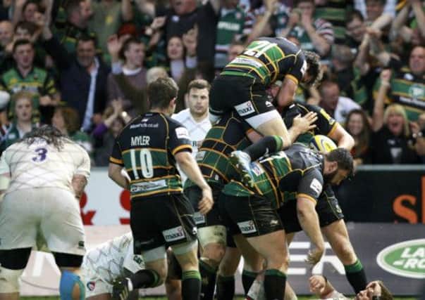 ALL CHANGE? - Saints celebrate Tom Wood's try against Leicester, but Jim Mallinder may rotate his squad for Friday's Amlin Challenge Cup Final against Bath (Picture: Linda Dawson)