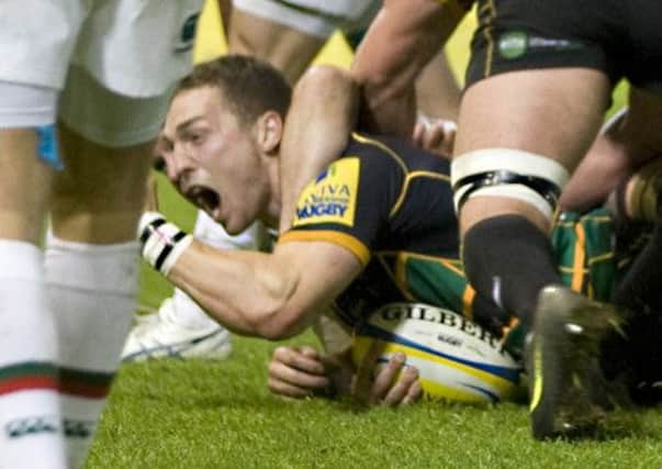 BIG MOMENT - George North goes over for his try for Saints against Tigers (Picure: James Phillips)